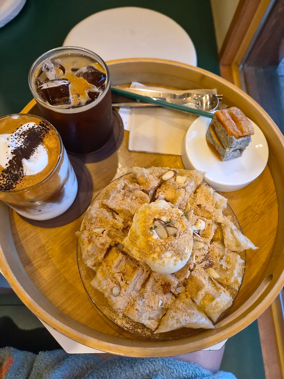 Tray of drinks and desserts served together
