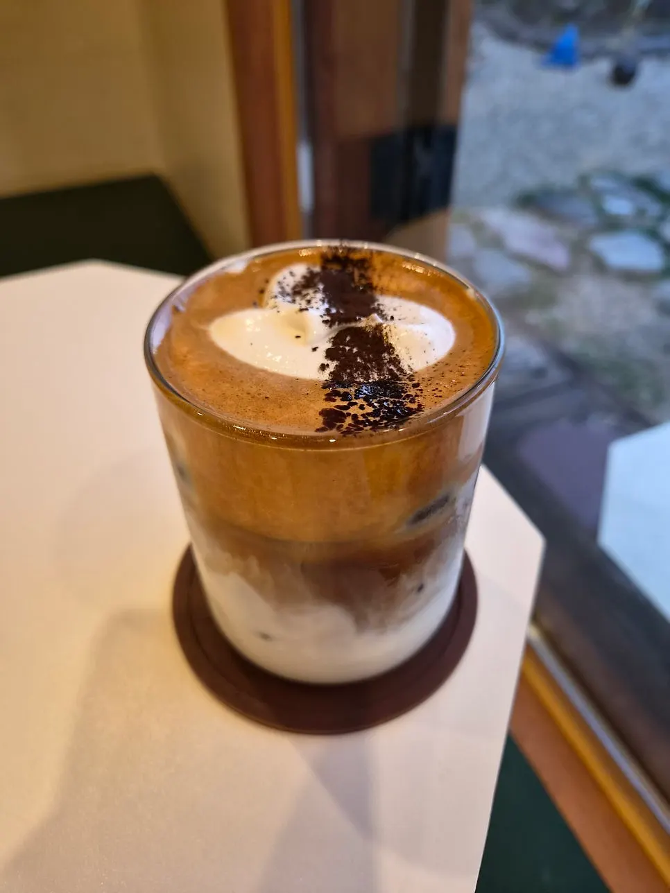 Vanilla bean cream latte topped with cream