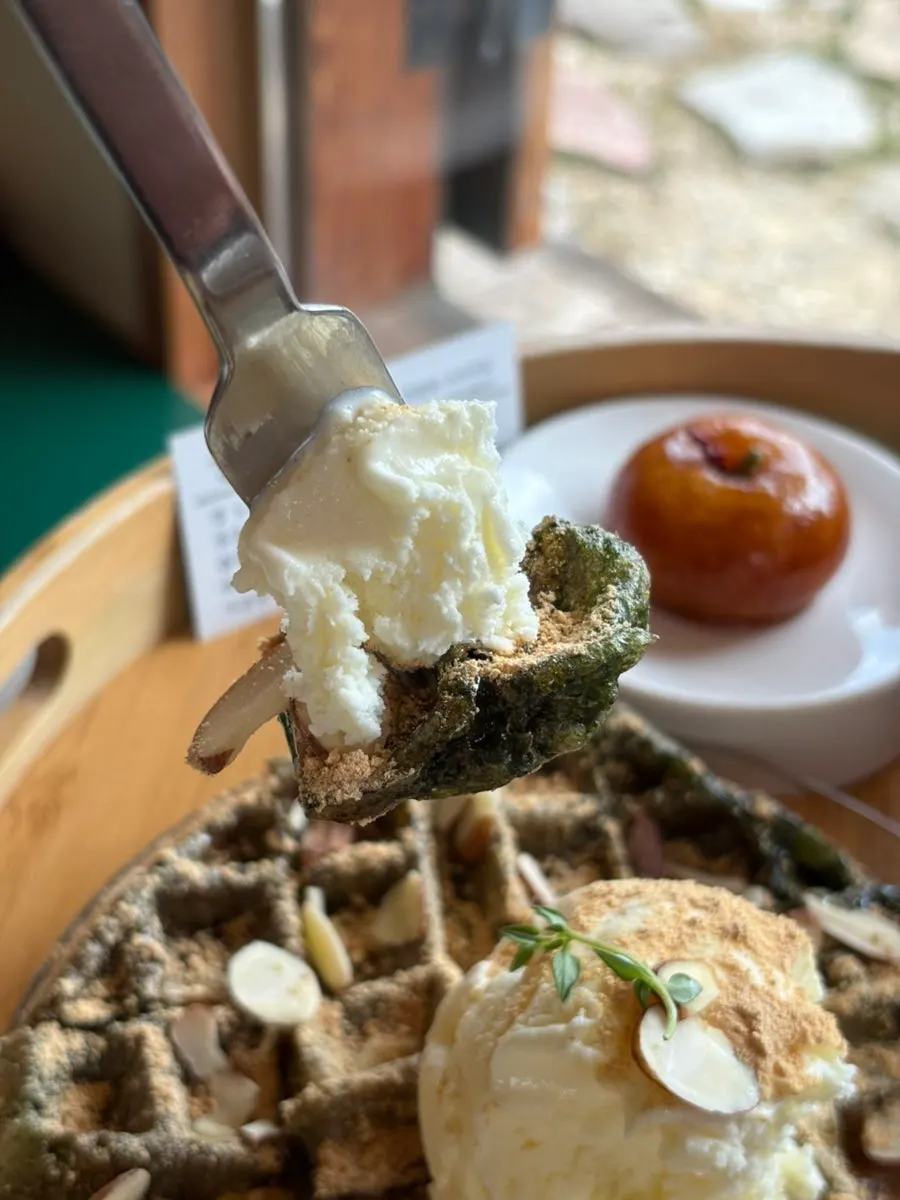 Mugwort injeolmi waffle topped with vanilla ice cream