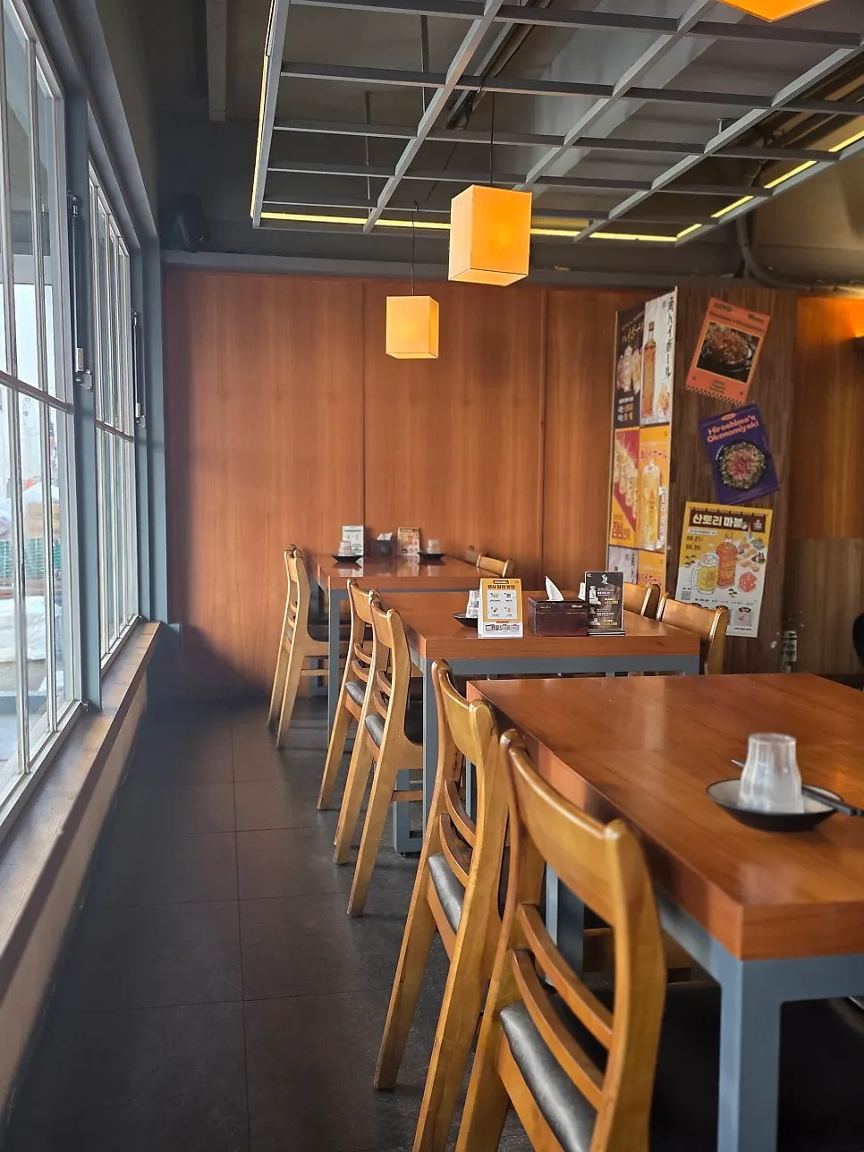 Izakaya interior lit with dim ambient lighting