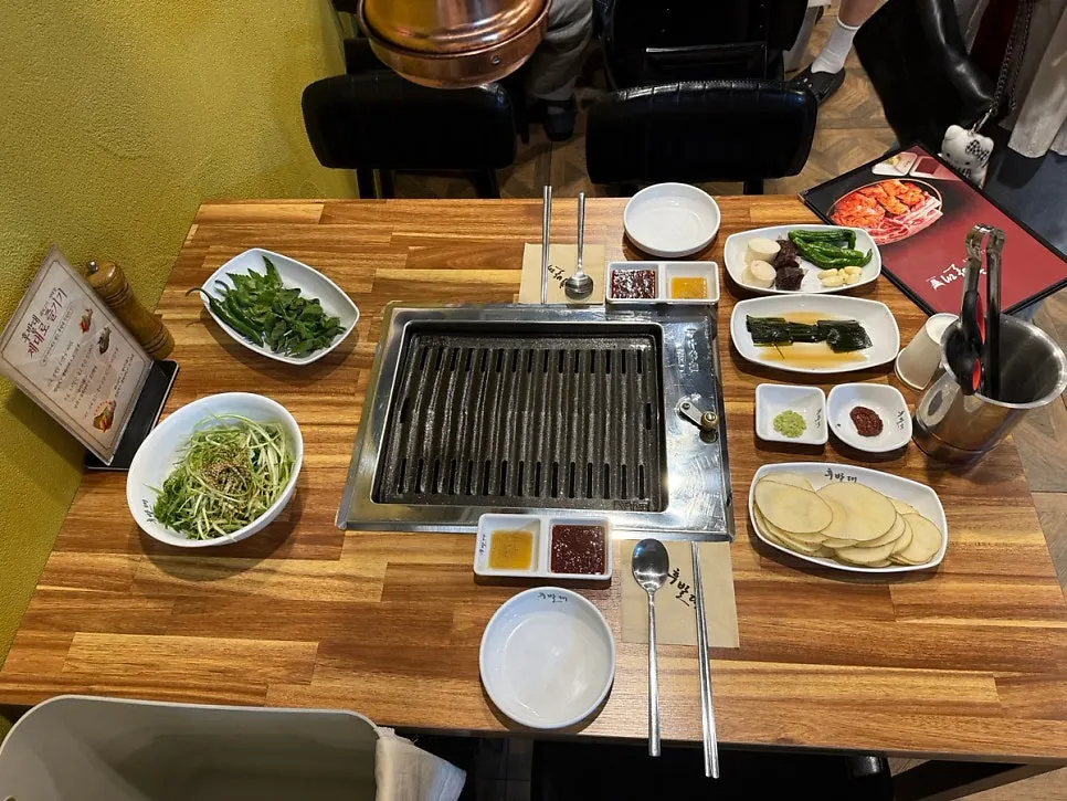 Basic table setting with side dishes at Hubaldae