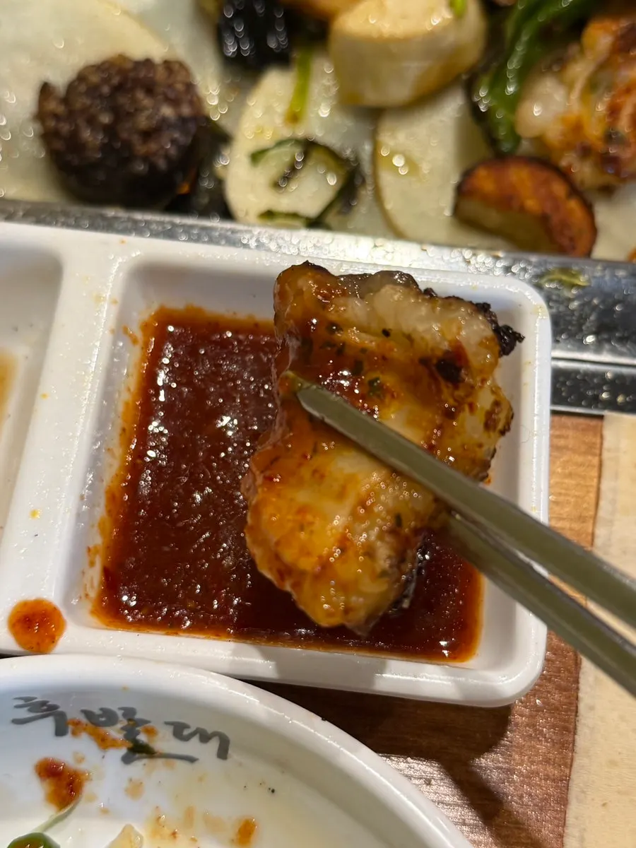 Daechang, sundae and shredded scallion wrap