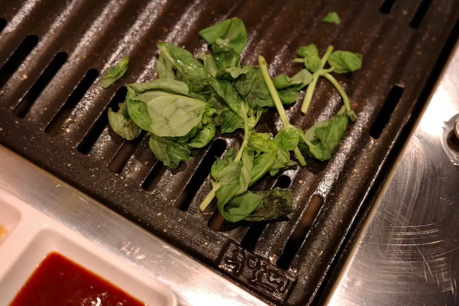 Basil and danggwi grilling on the pan