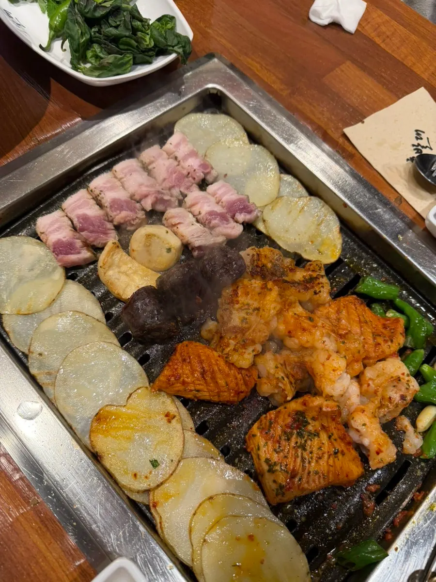 A golden-brown piece of grilled pork belly