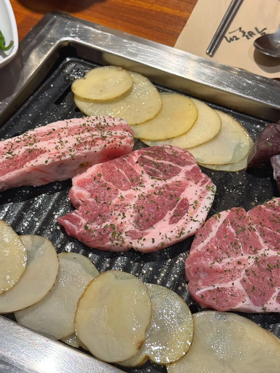 Pork belly and pork neck on the grill