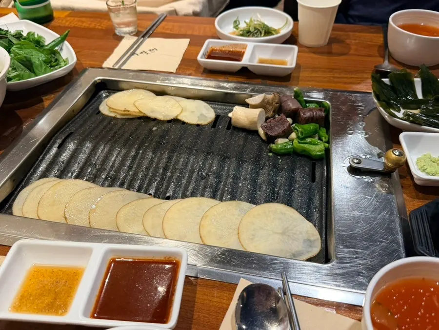 Side dish plate of thin-sliced potato and basil