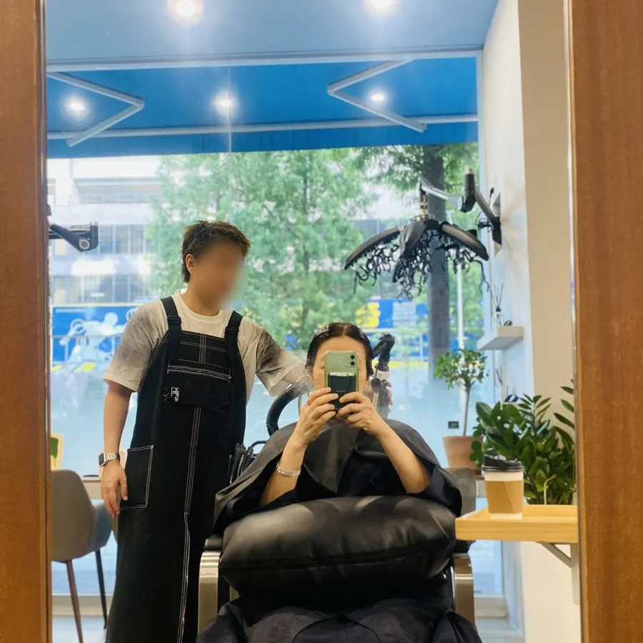 Step 2 Shiseido clinic product applied to hair