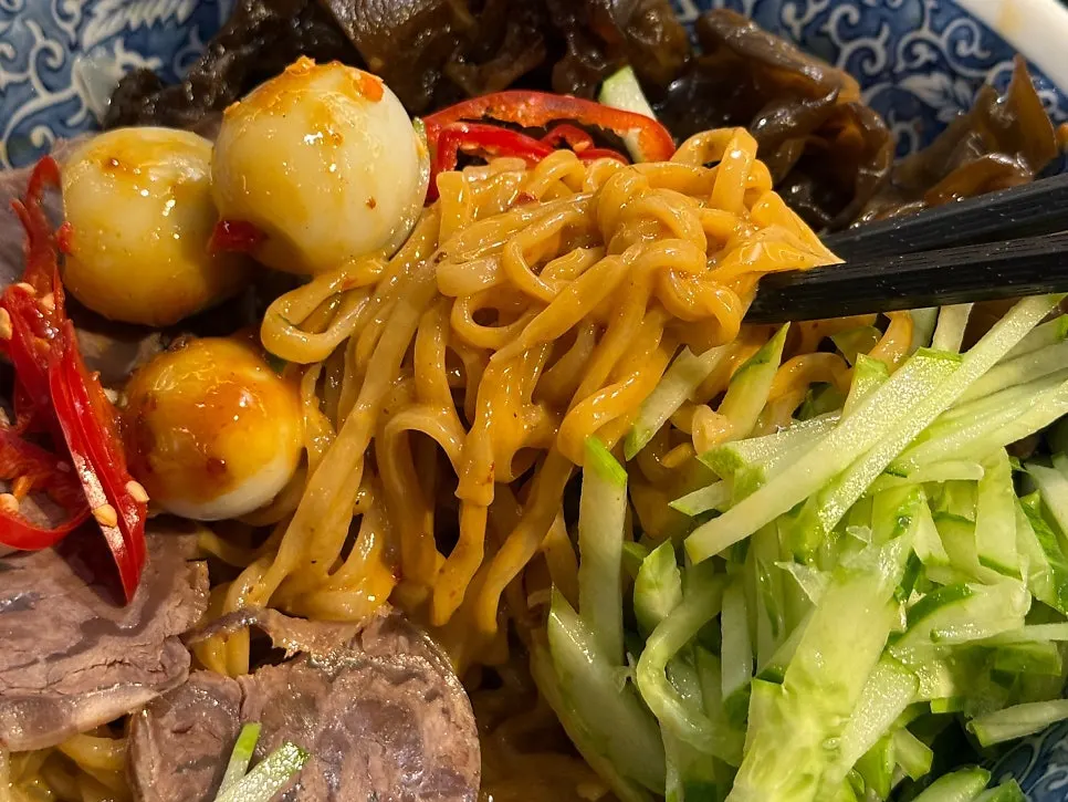 Majangmyeon topped with braised beef shank and wood ear mushrooms