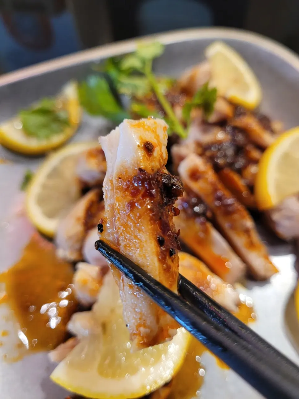 Cold Sichuan-style chicken gusungye topped with chili oil sauce