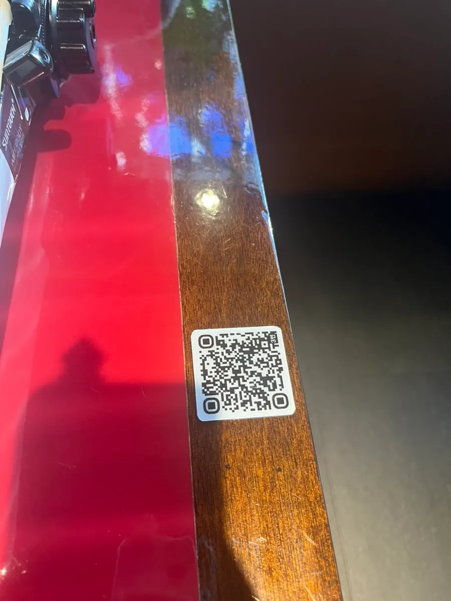 QR code order instructions on a table at Huhugwan