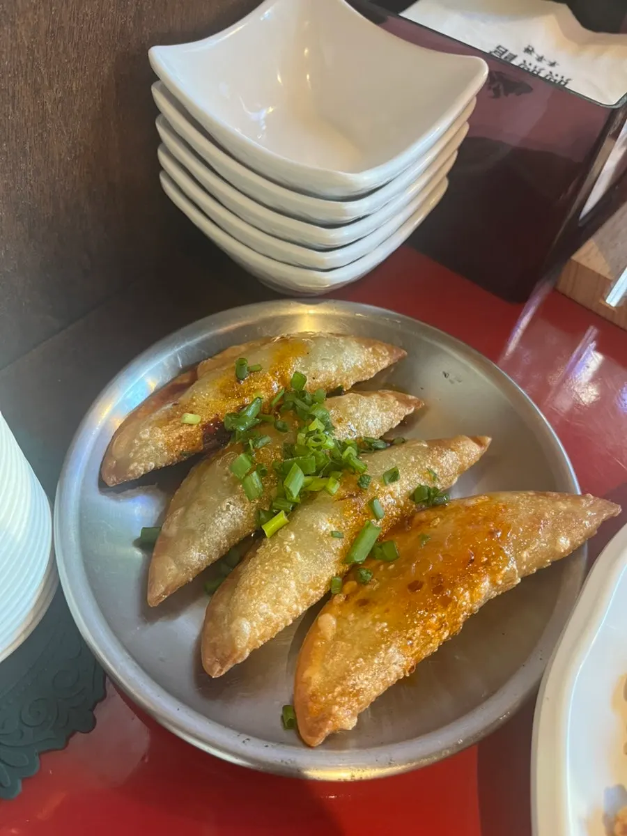 A plate of fluffy garlic scape fried rice