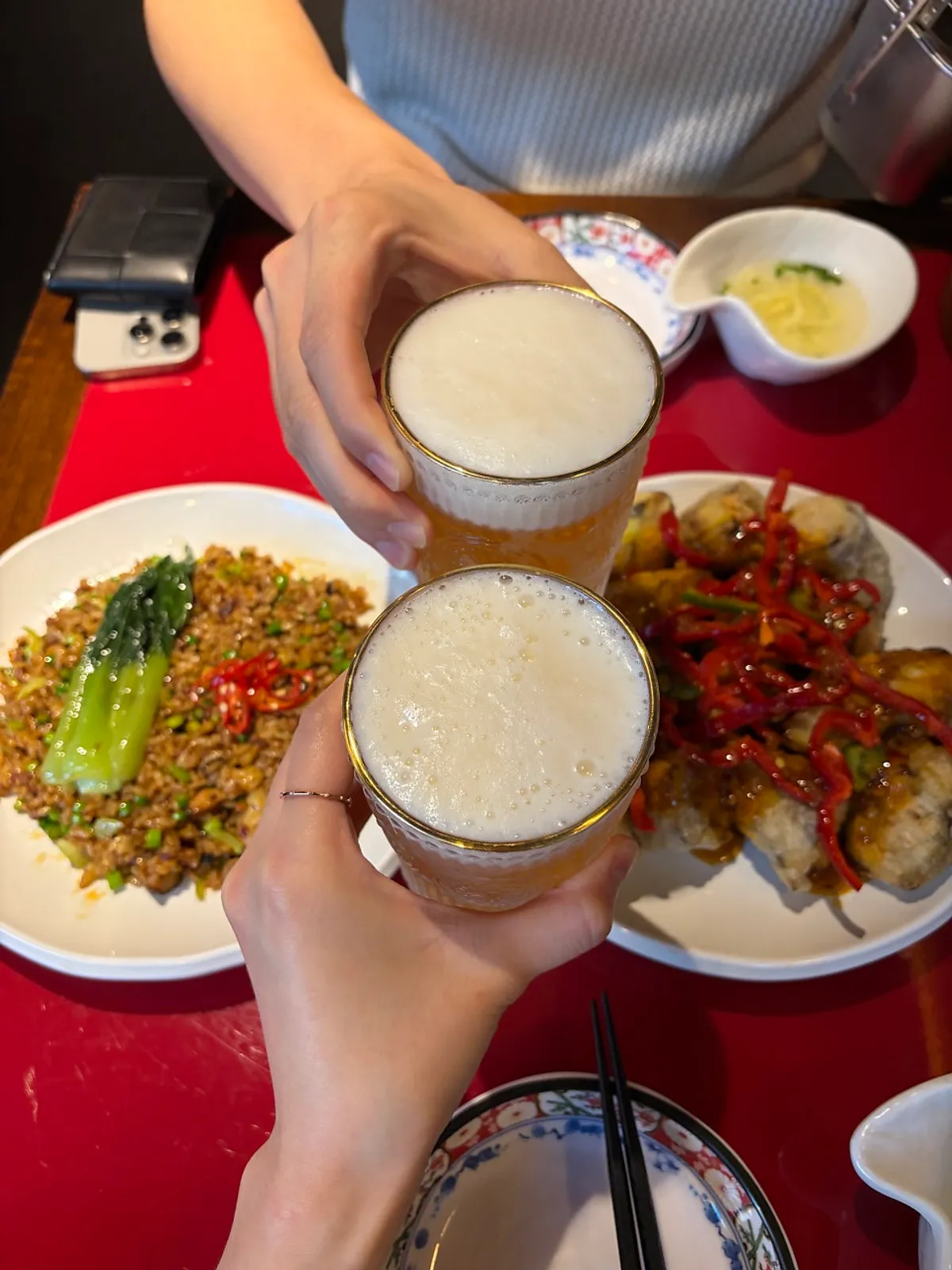 Tsingtao draft beer enjoyed alongside the fried eggplant