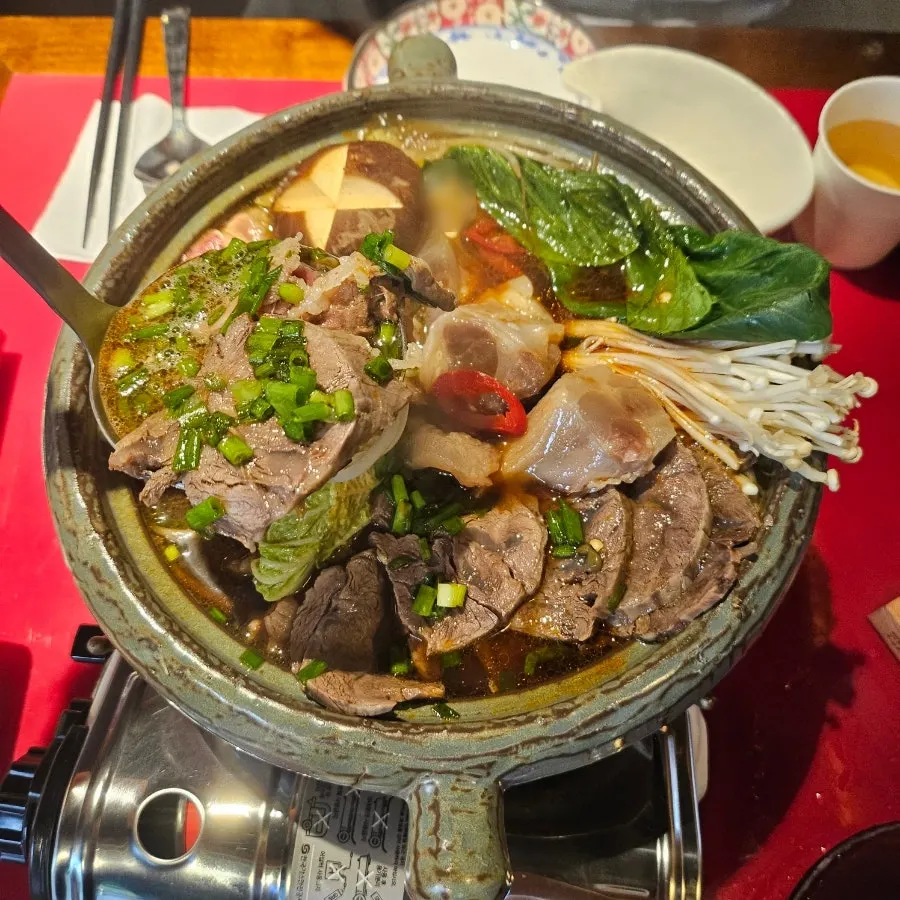 Beef shank hot pot with mushrooms and bok choy