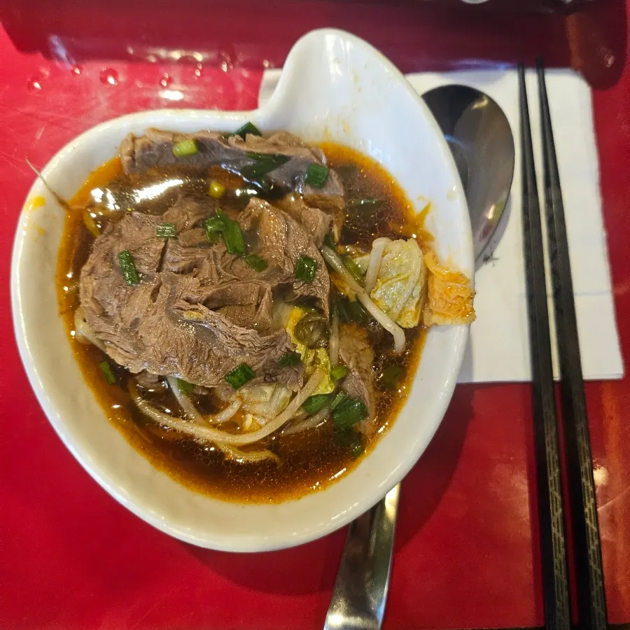 A personal bowl scooped from the beef shank hot pot