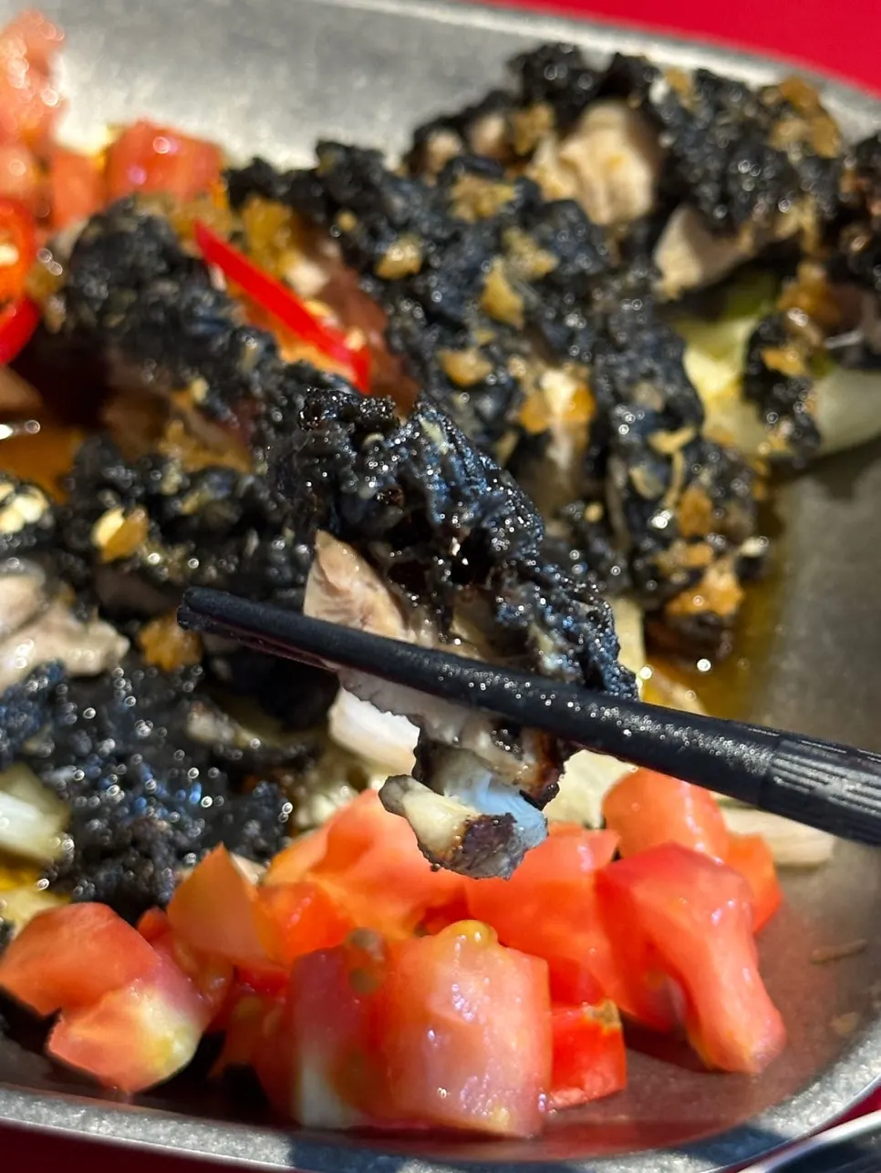 Huhugwan's yurinchi fried in a squid-ink batter