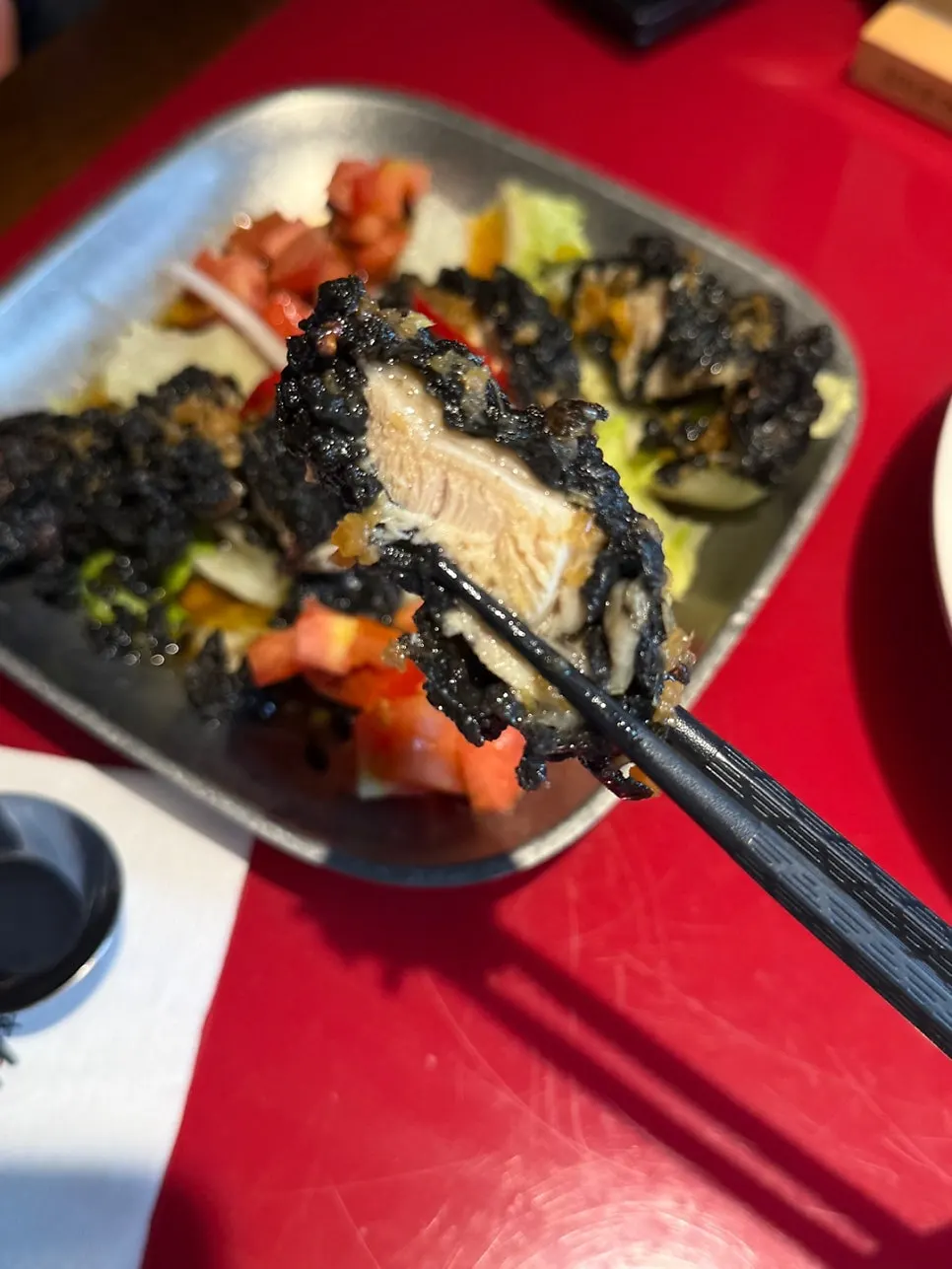 Yurinchi served with lettuce and tomato marinated in sauce