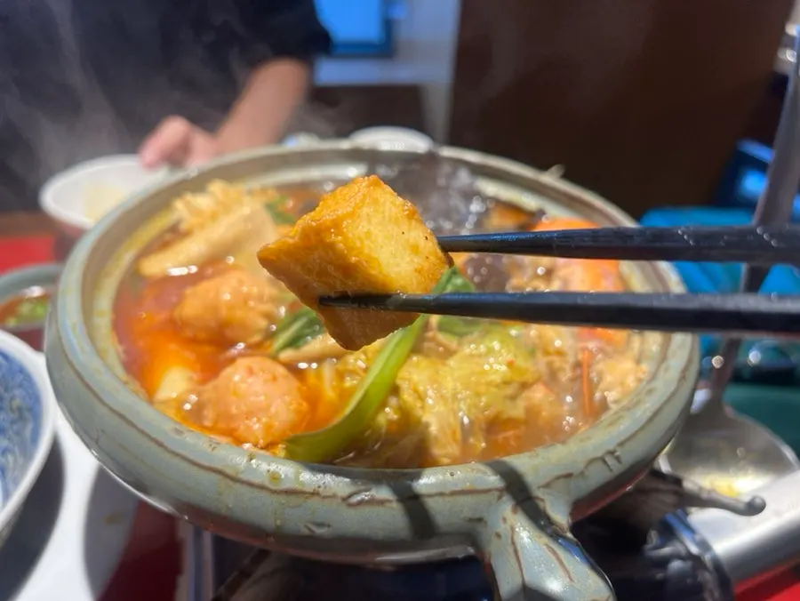 Square fish cake inside the mala hot pot