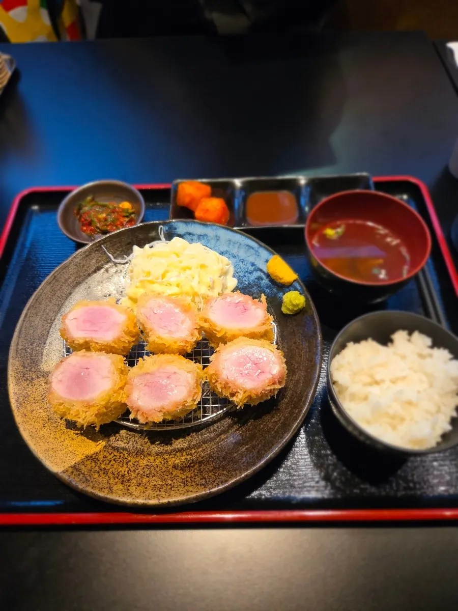 Table setting with hire katsu set and cheese kimchi jjigae set