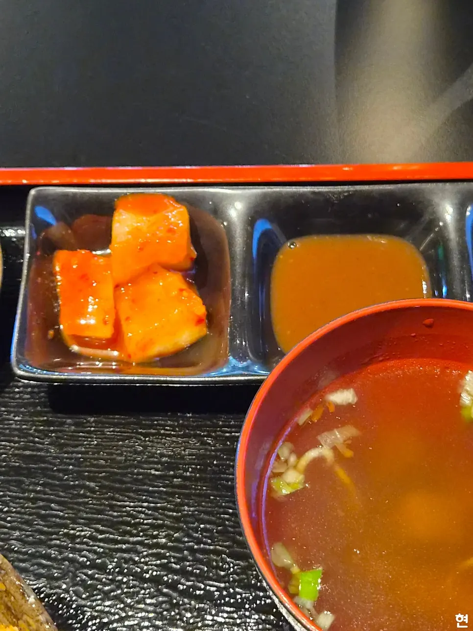 Three dipping sauces: salt, katsu sauce, and wasabi