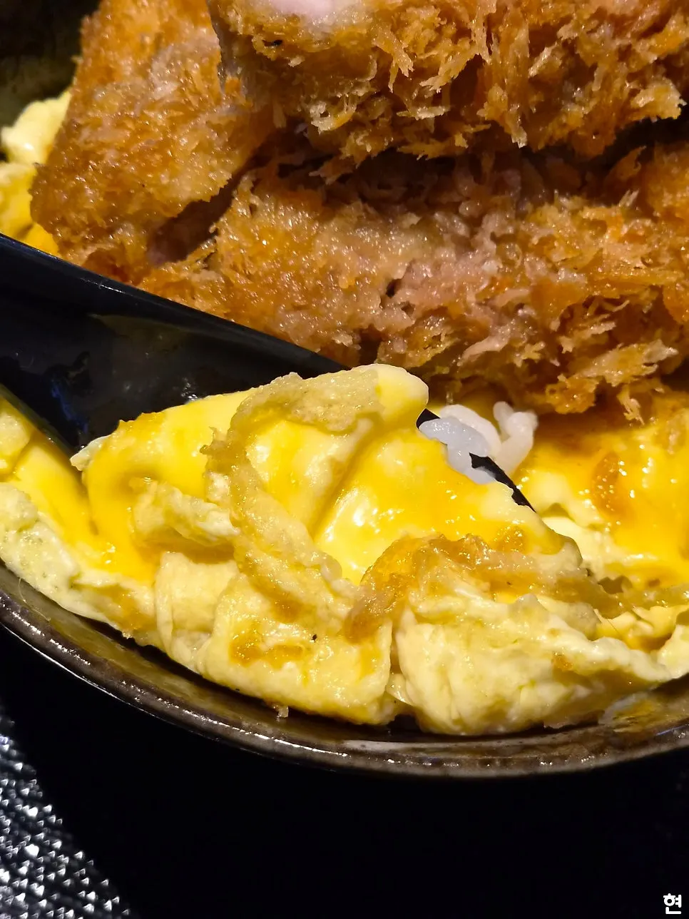 Rice and katsu soaked with the tare sauce