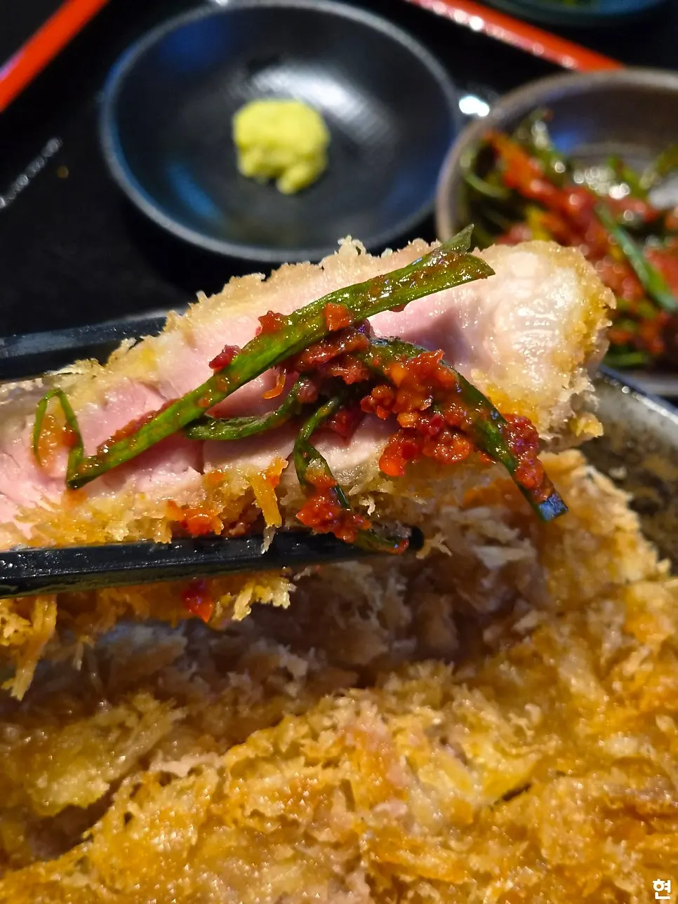 Softly cooked egg over the katsudon