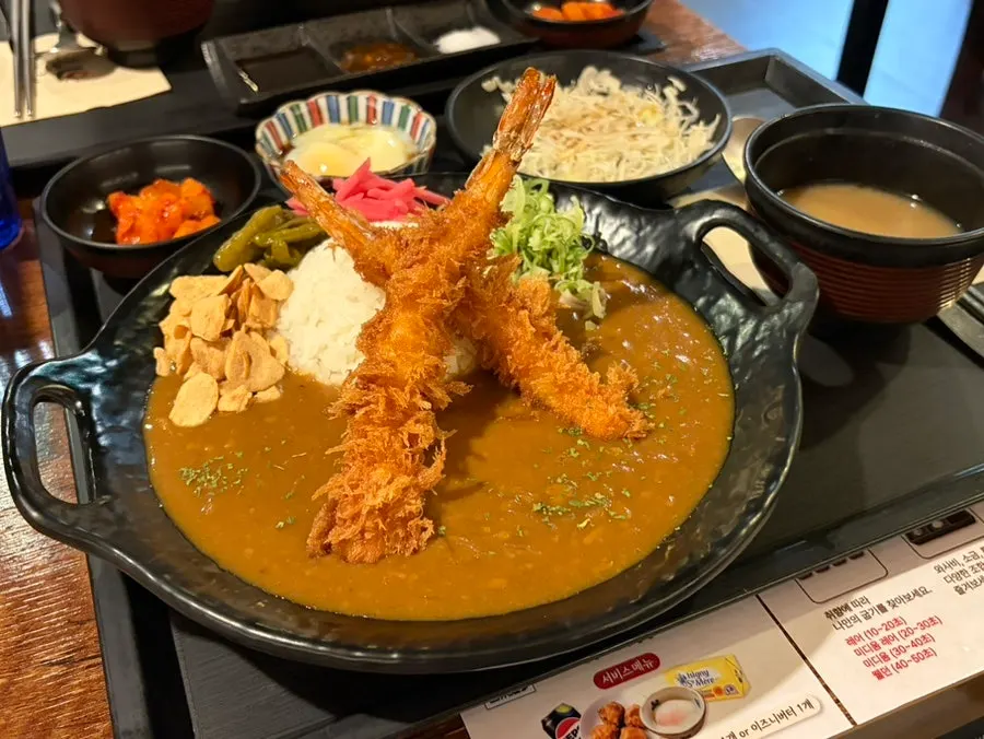 Yamagata mince curry topped with a poached egg