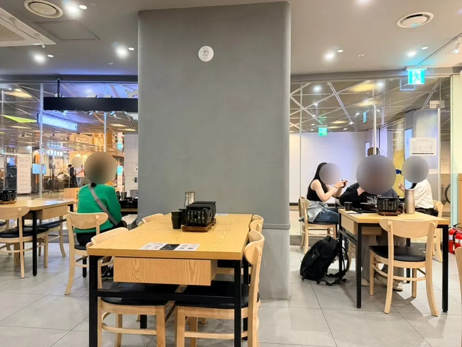 Seating area with two-person and four-person tables