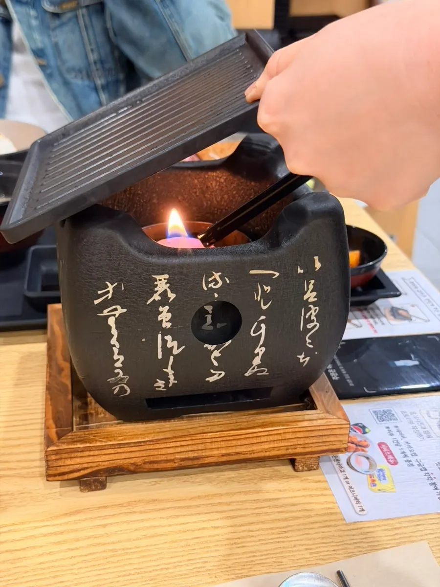 Personal brazier lit by a staff member