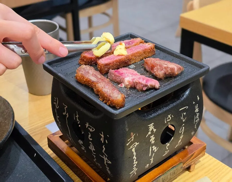 Isigny salted butter placed on top of the gyukatsu