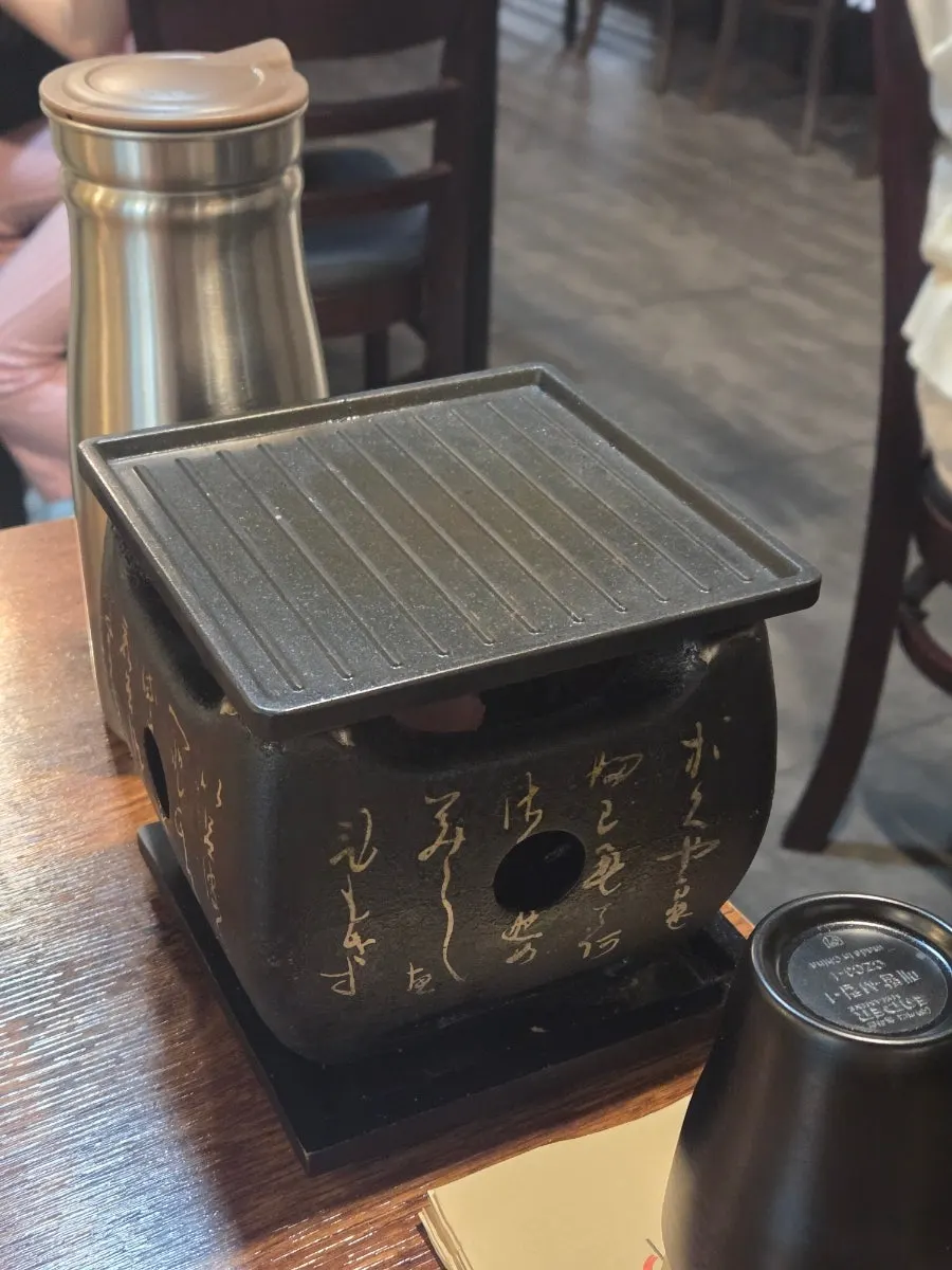 Table setting with two gyukatsu orders and a zero-calorie cola