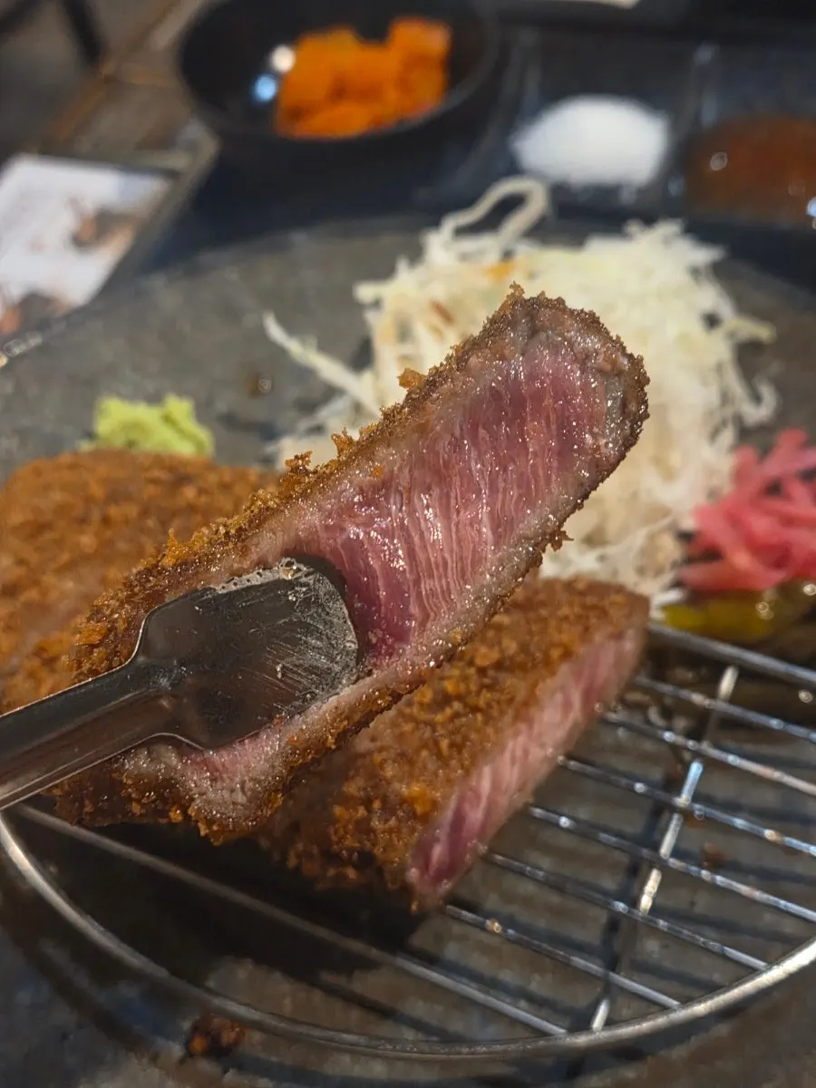 Gyukatsu cooking on the personal brazier
