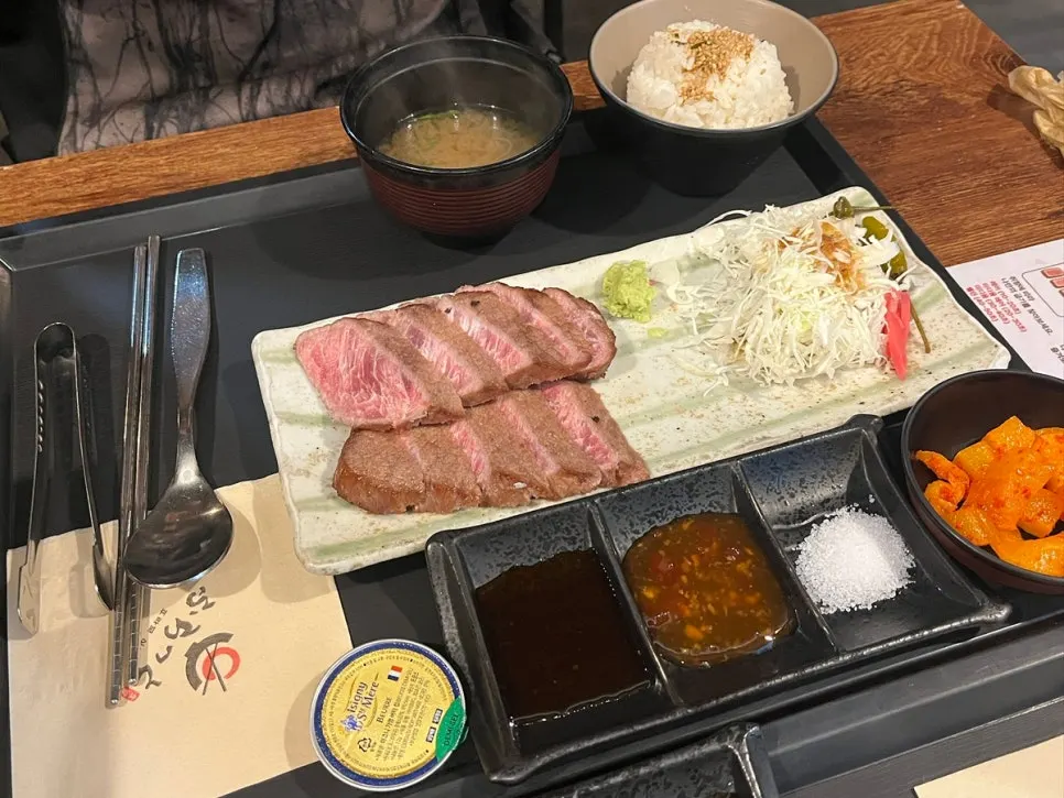 Table with gyukatsu, rice, and soup