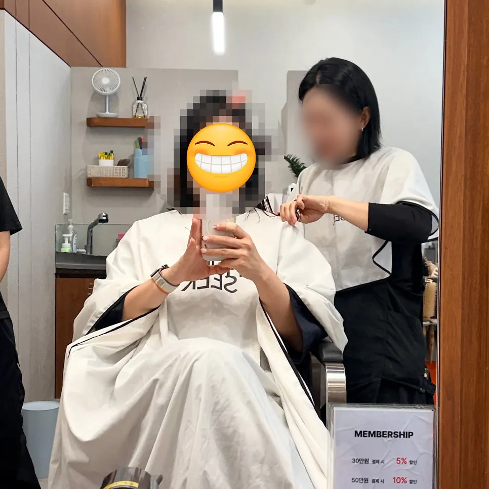 Women's cut being done after the clinic