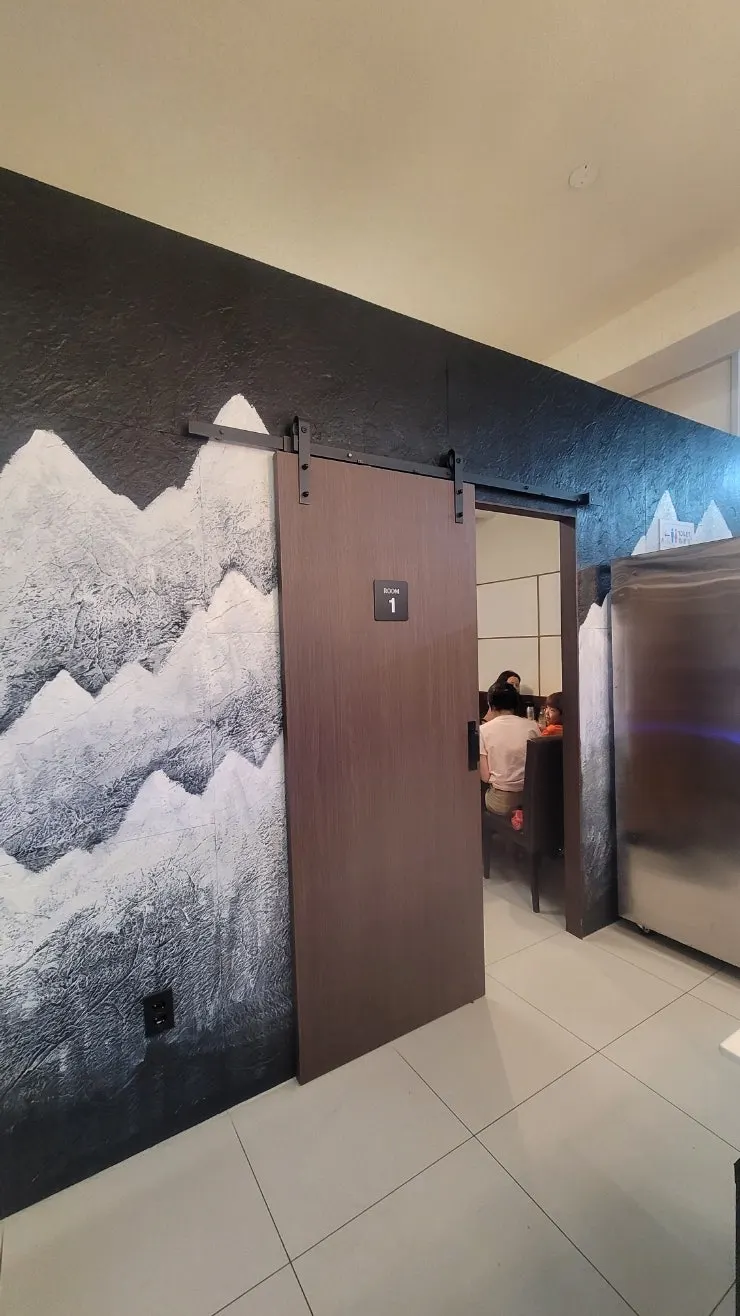 A private room with a sliding door