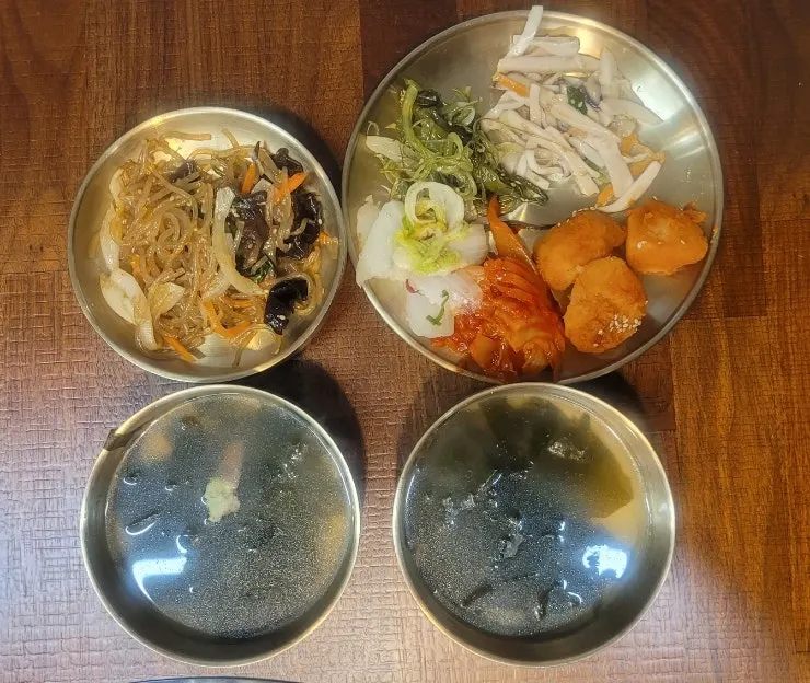 Side dishes arranged in brass bowls