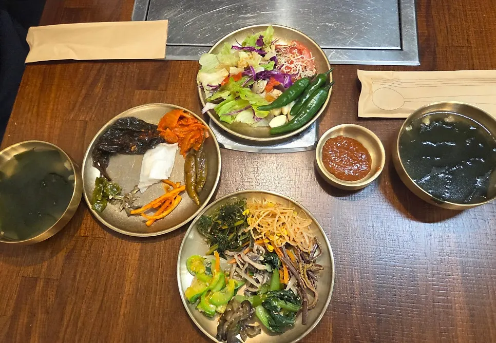 Plate of namul side dishes gathered from the self-serve bar