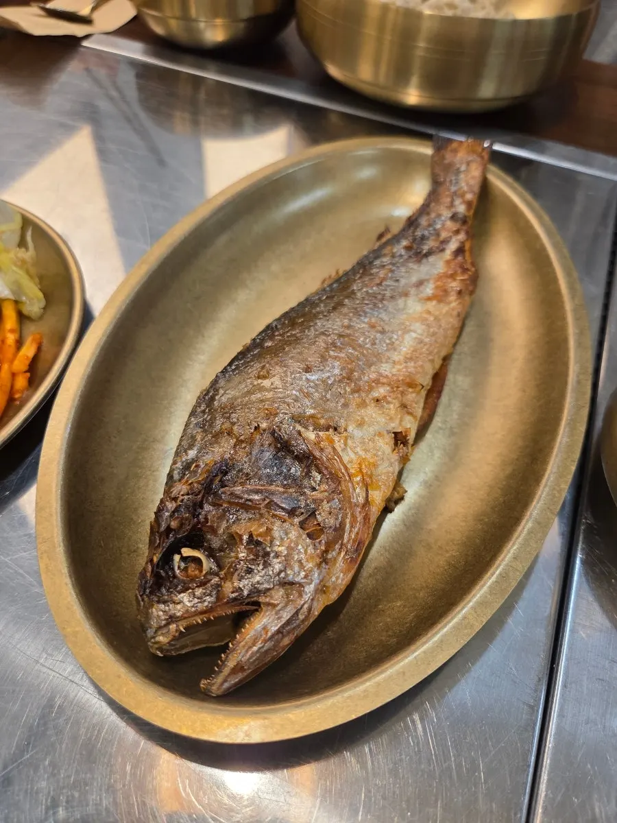 Plate of wood-fired grilled hairtail