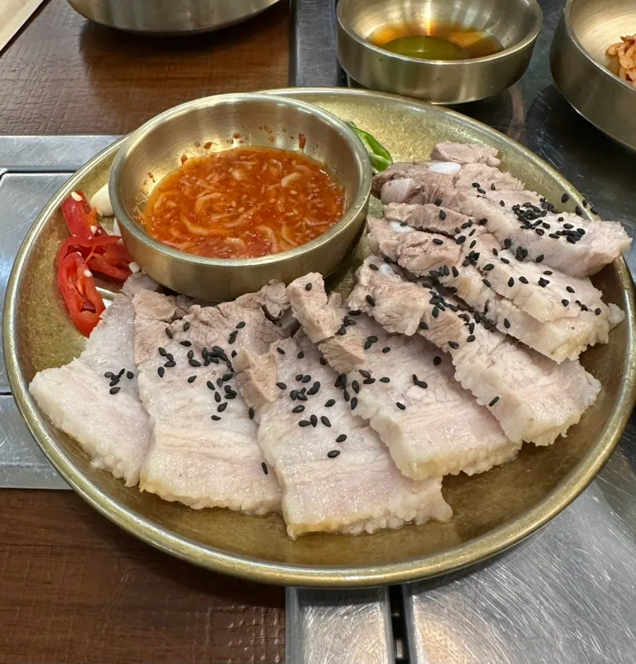Table set with barley rice, gochujang, and sesame oil