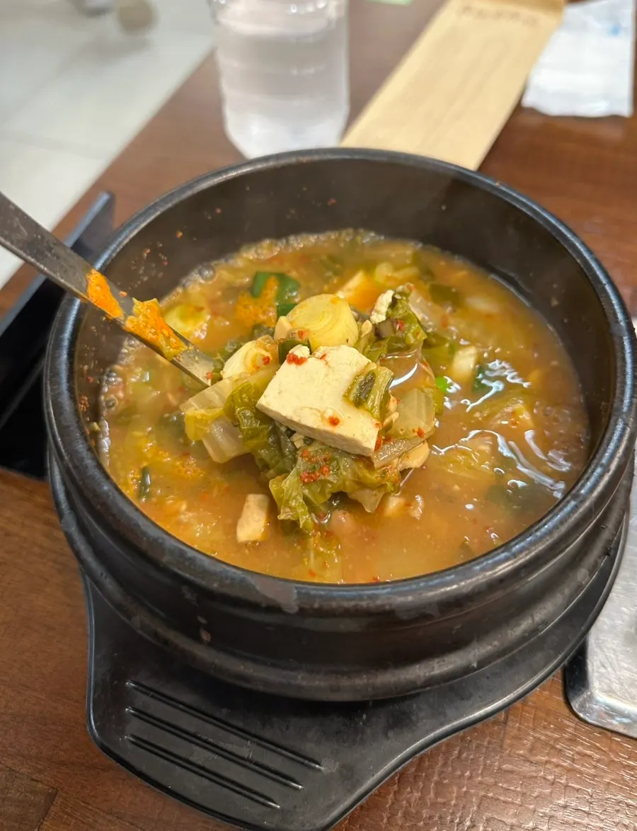 Doenjang jjigae bubbling in a stone pot