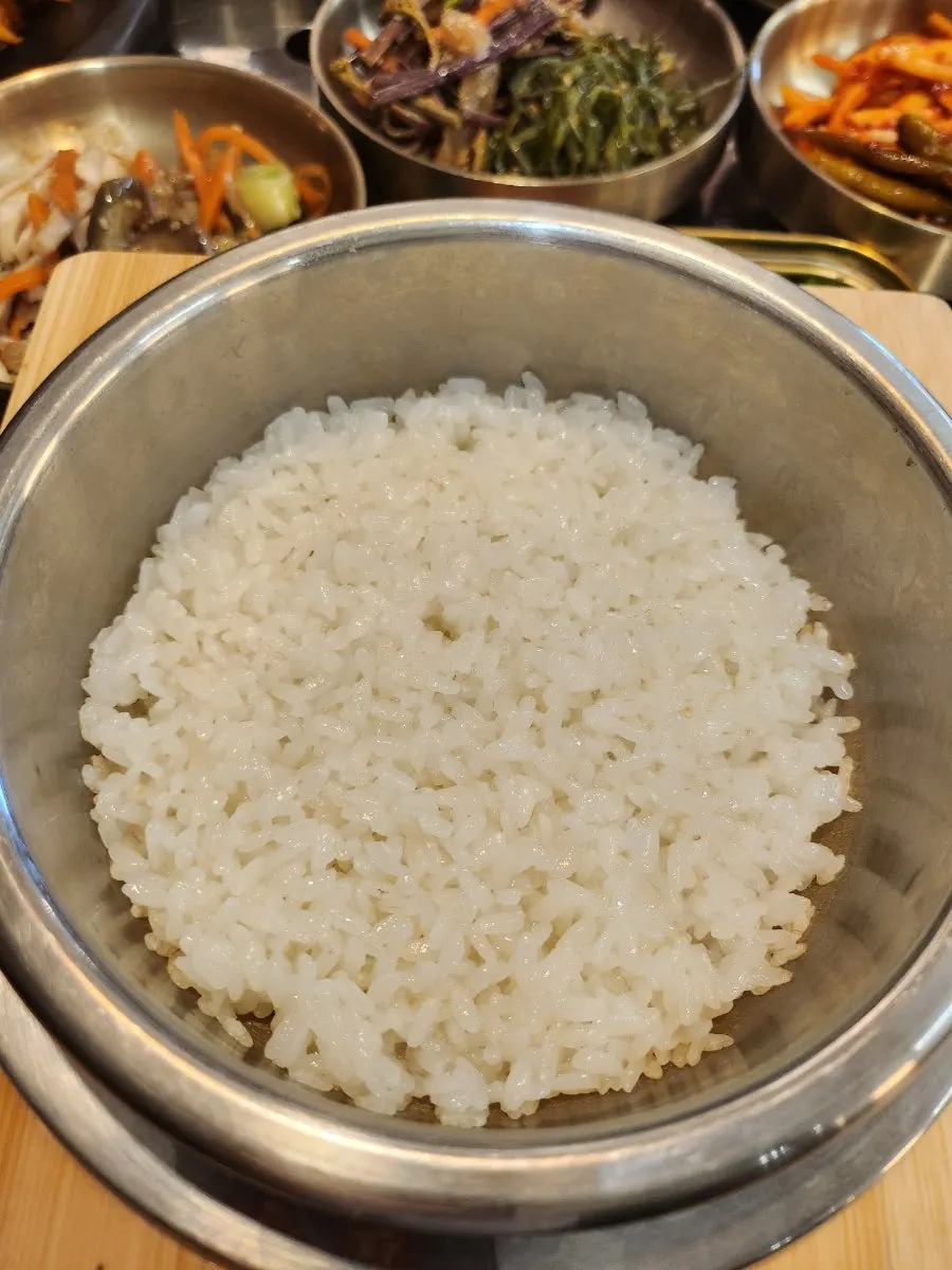 Set menu spread with self-serve bar side dishes