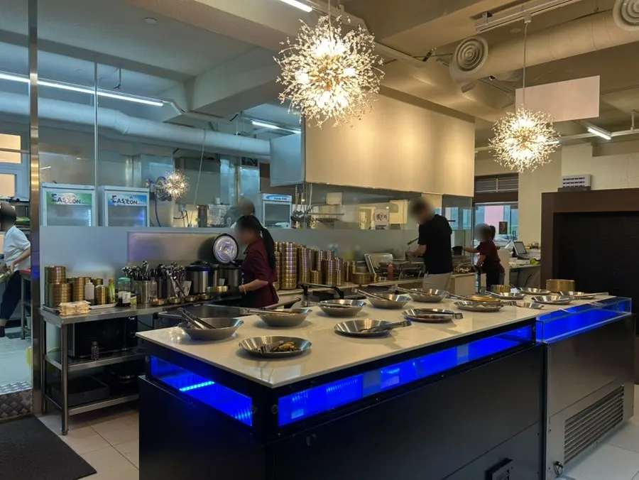 Hwadamga's self-serve bar with many side dishes