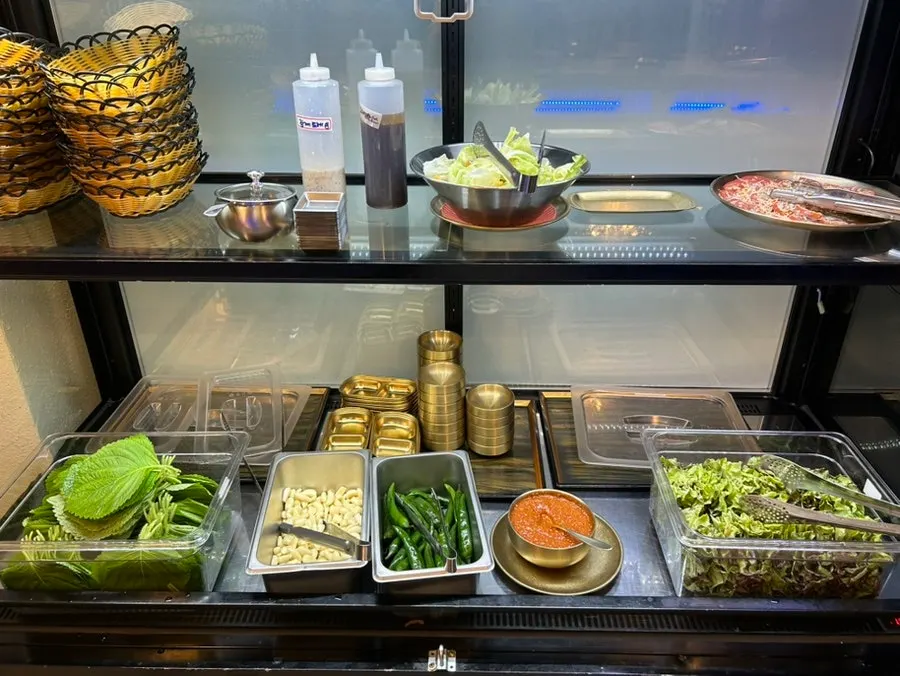 A plate of japchae and donggeurangttaeng from the self-serve bar