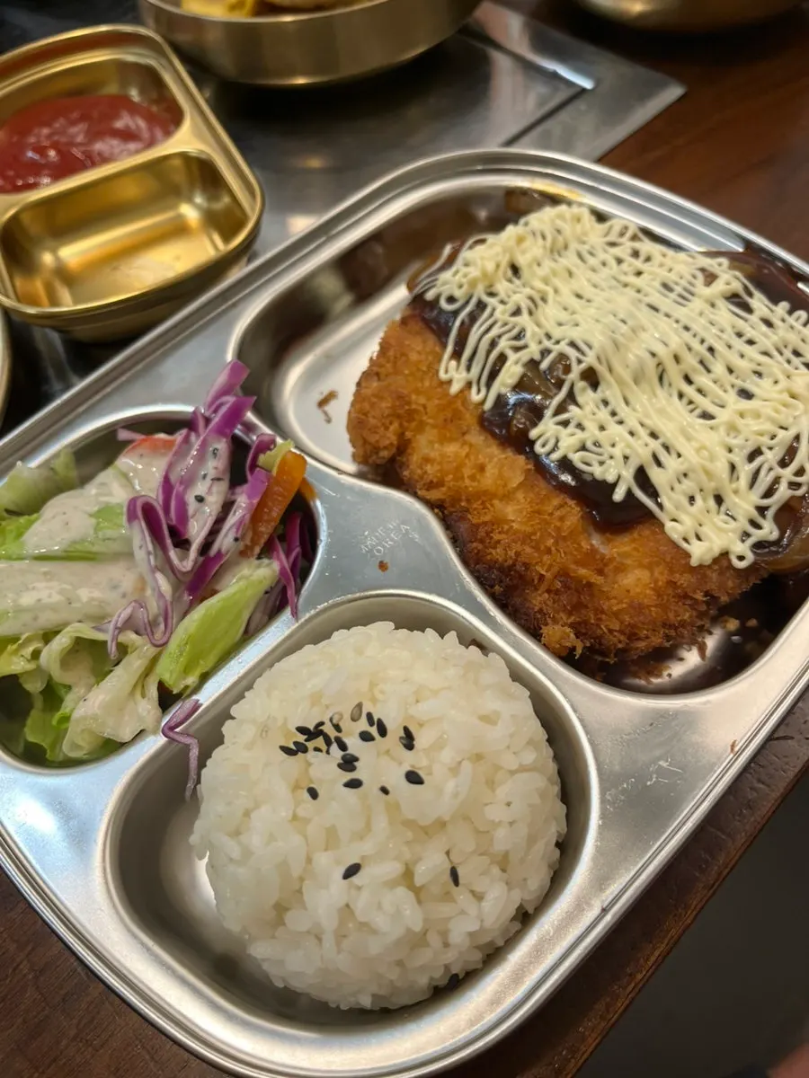 Kids' pork cutlet plated the size of a child's face