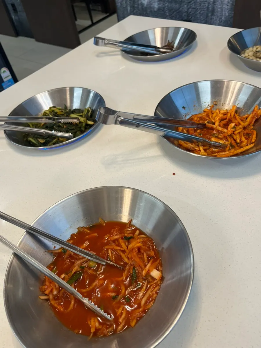 Assorted side dishes at the self-serve bar