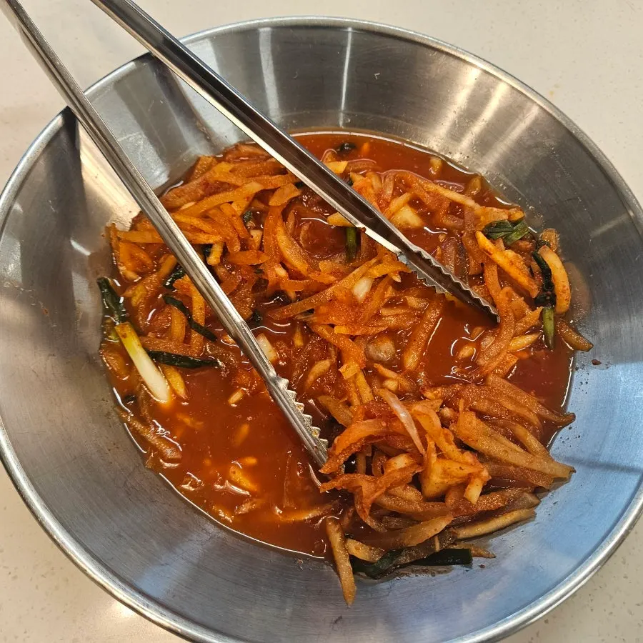 Side dishes displayed at Hwadamga's self-serve bar