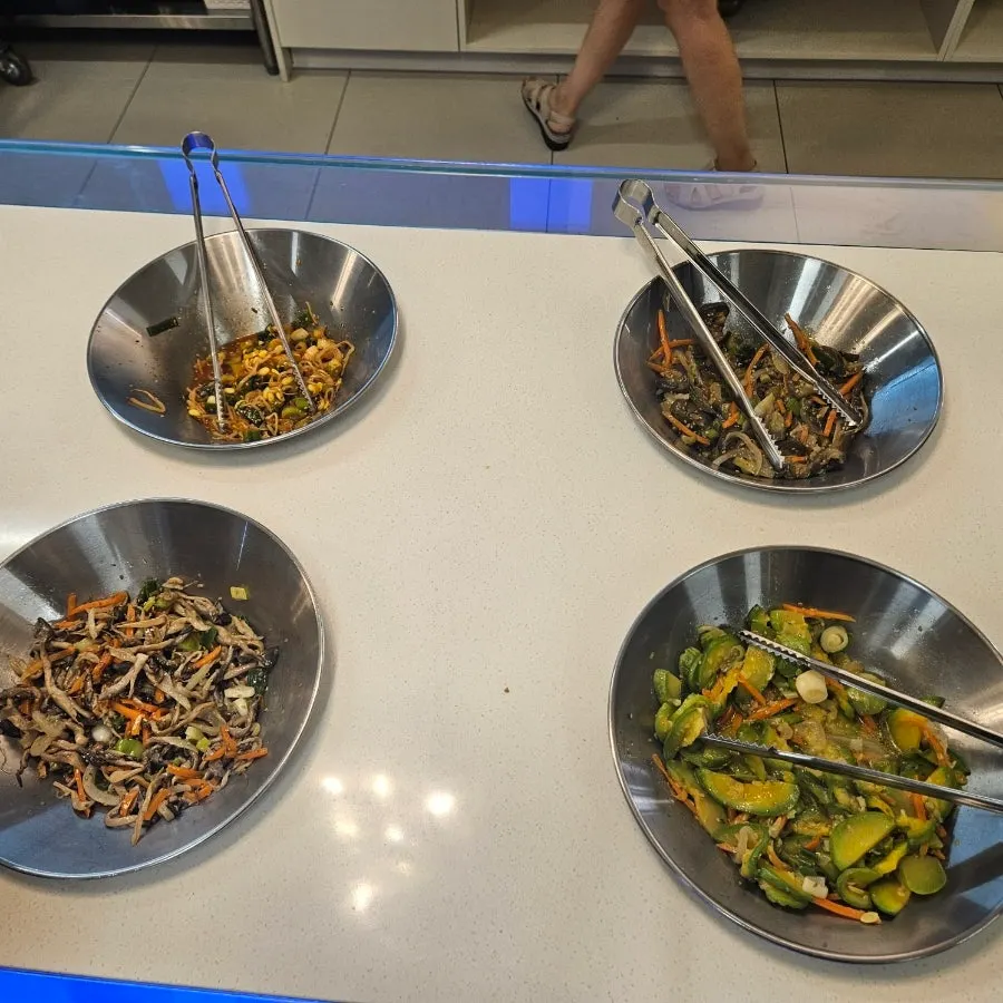 Namul and side dishes taken from the self-serve bar