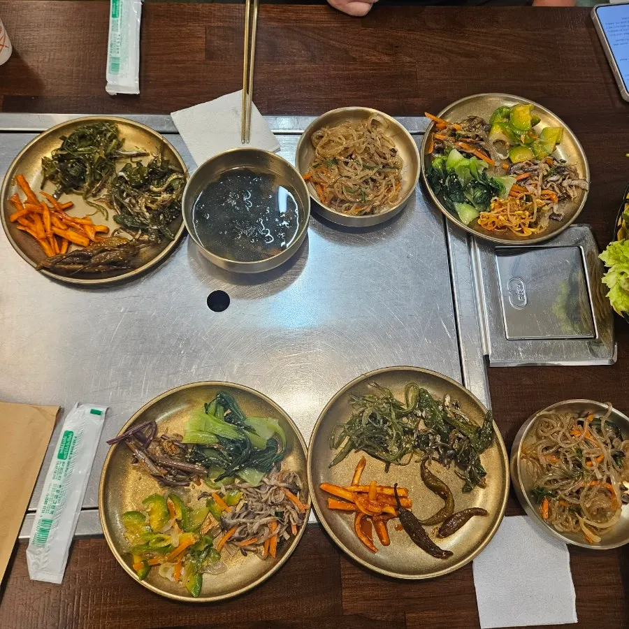 A table spread of side dishes