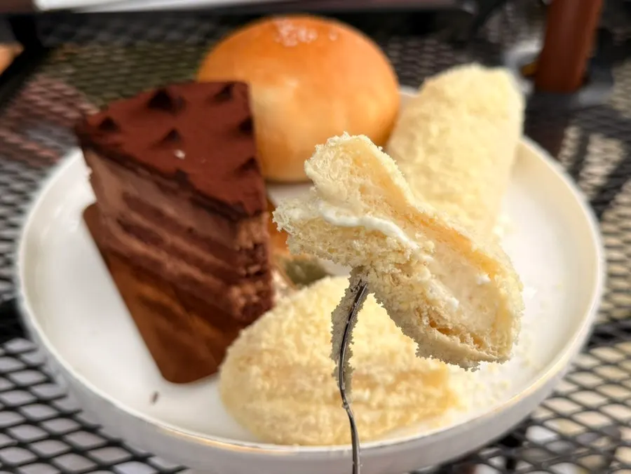 Cross-section of choco cake cut with a fork