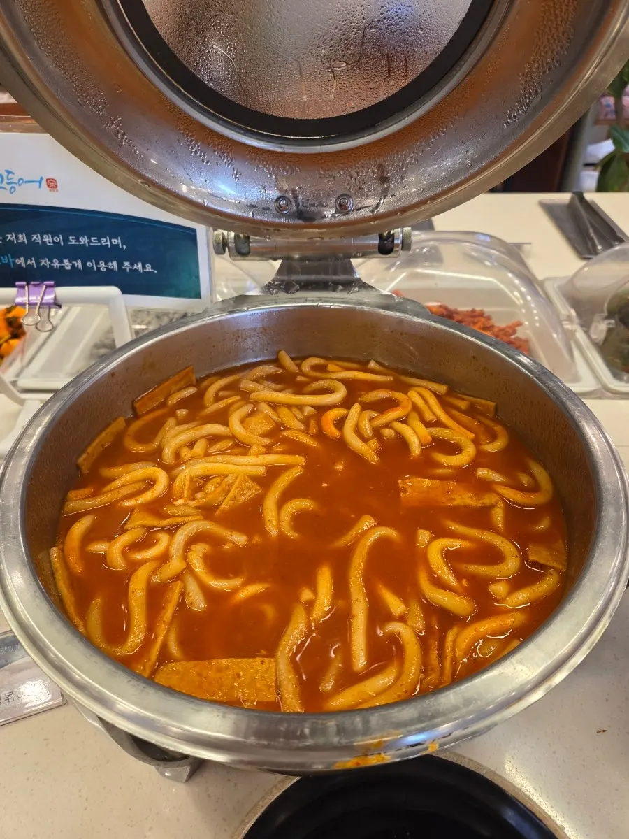 Vertical shot of a table set with banchan