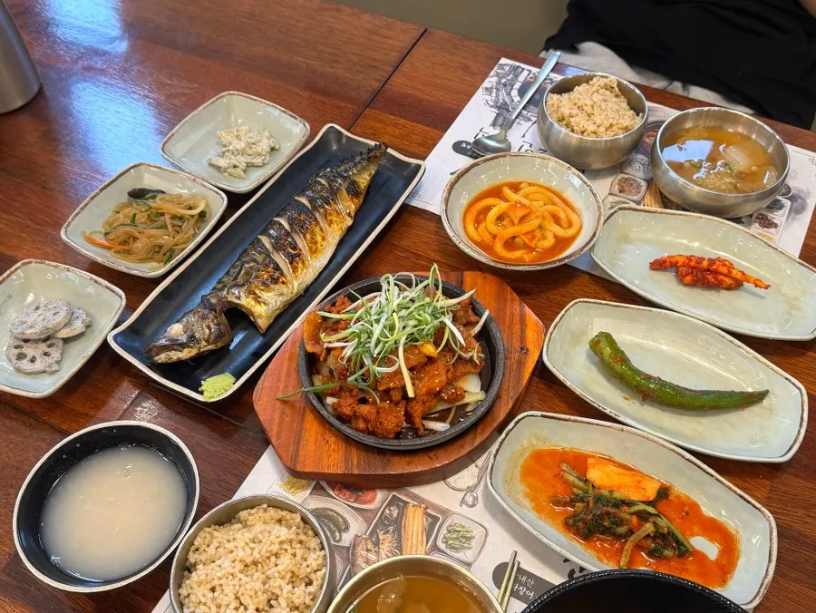 Mackerel set and pork set laid out on the table